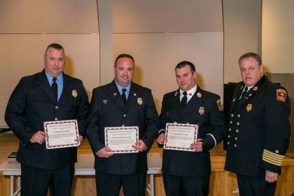 Fire Chief's Commendation - (L-R) FF. Dennis Maher, FF. Christopher Drinan, Lt. Rick Nohl, Chief David Frizzell